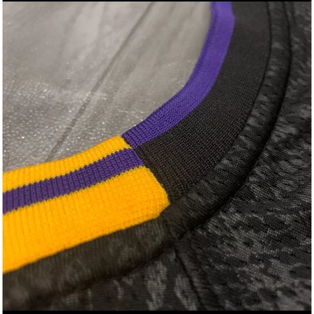 ed7b1d8b8dfe1e345a1c66dfb2ba278a.jpeg Unisex Los Angeles Lakers #77 Luka Doncic Black Swingman City Edition Jersey